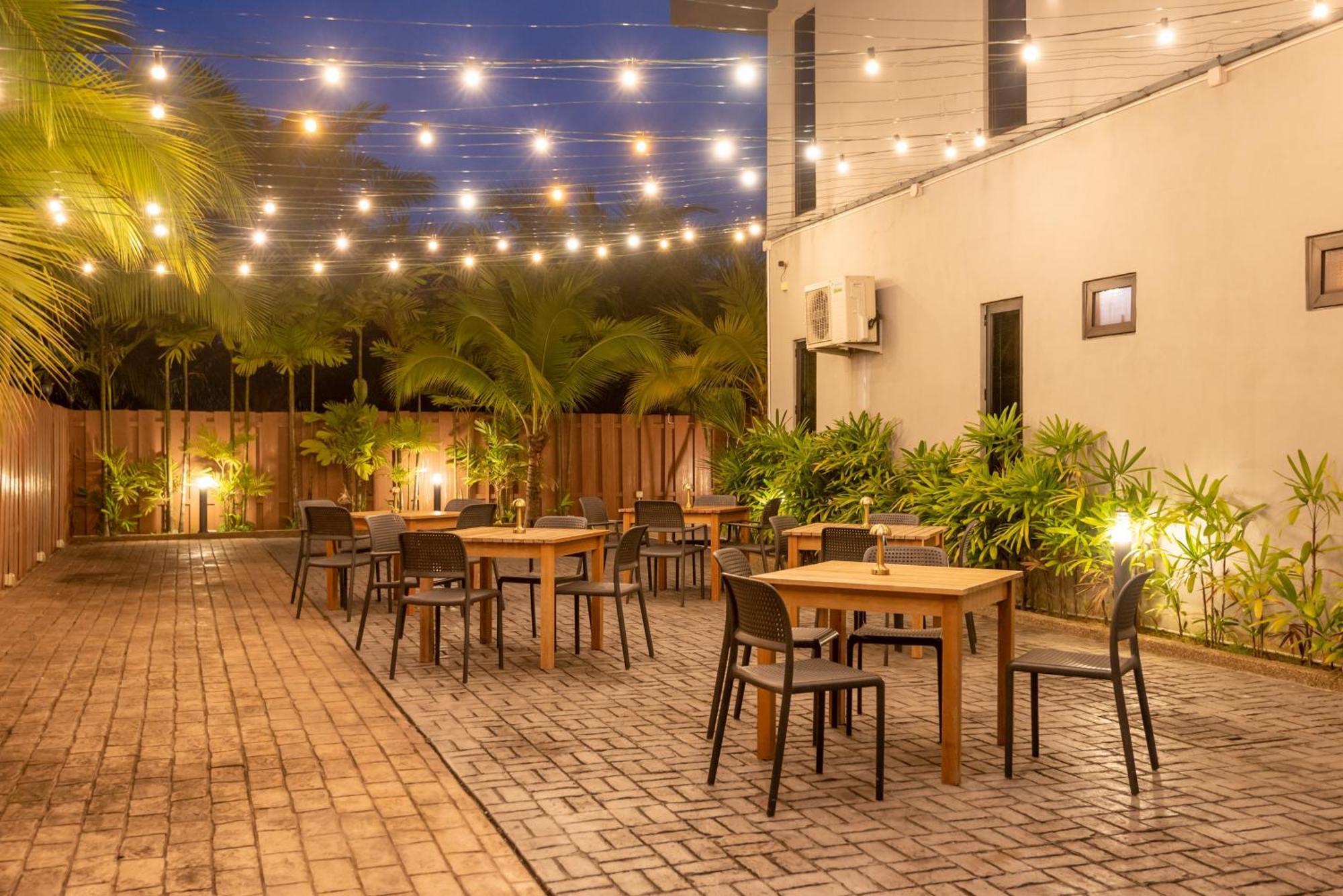 ตาซิก์ วิลลา อินเตอร์เนชั่นแนล รีสอร์ต Hotel พอร์ตดิ๊กสัน ภายนอก รูปภาพ The patio at the hotel