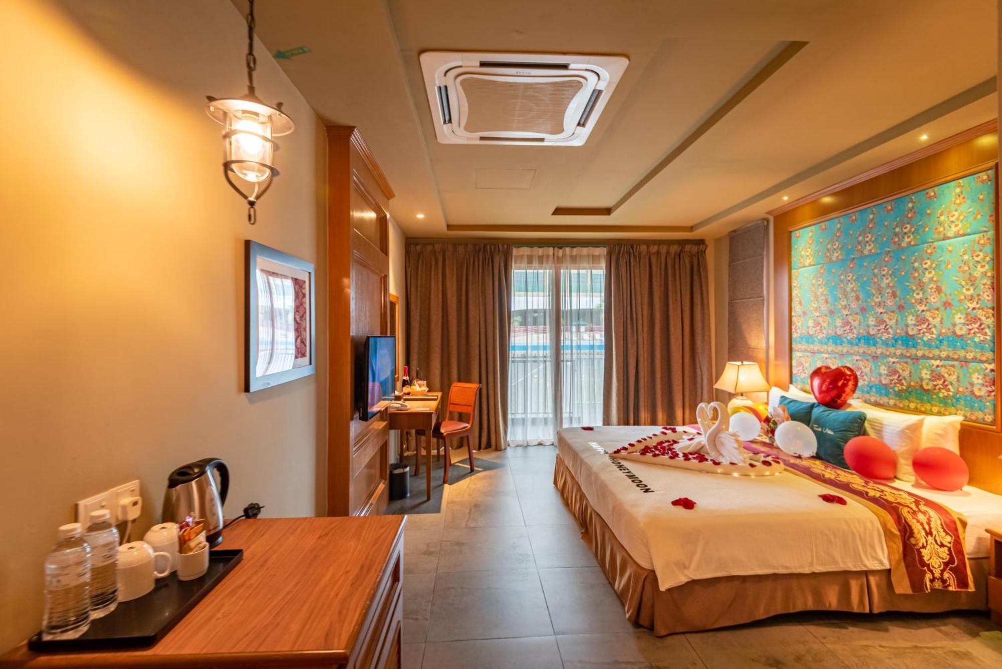ตาซิก์ วิลลา อินเตอร์เนชั่นแนล รีสอร์ต Hotel พอร์ตดิ๊กสัน ภายนอก รูปภาพ Deluxe Room