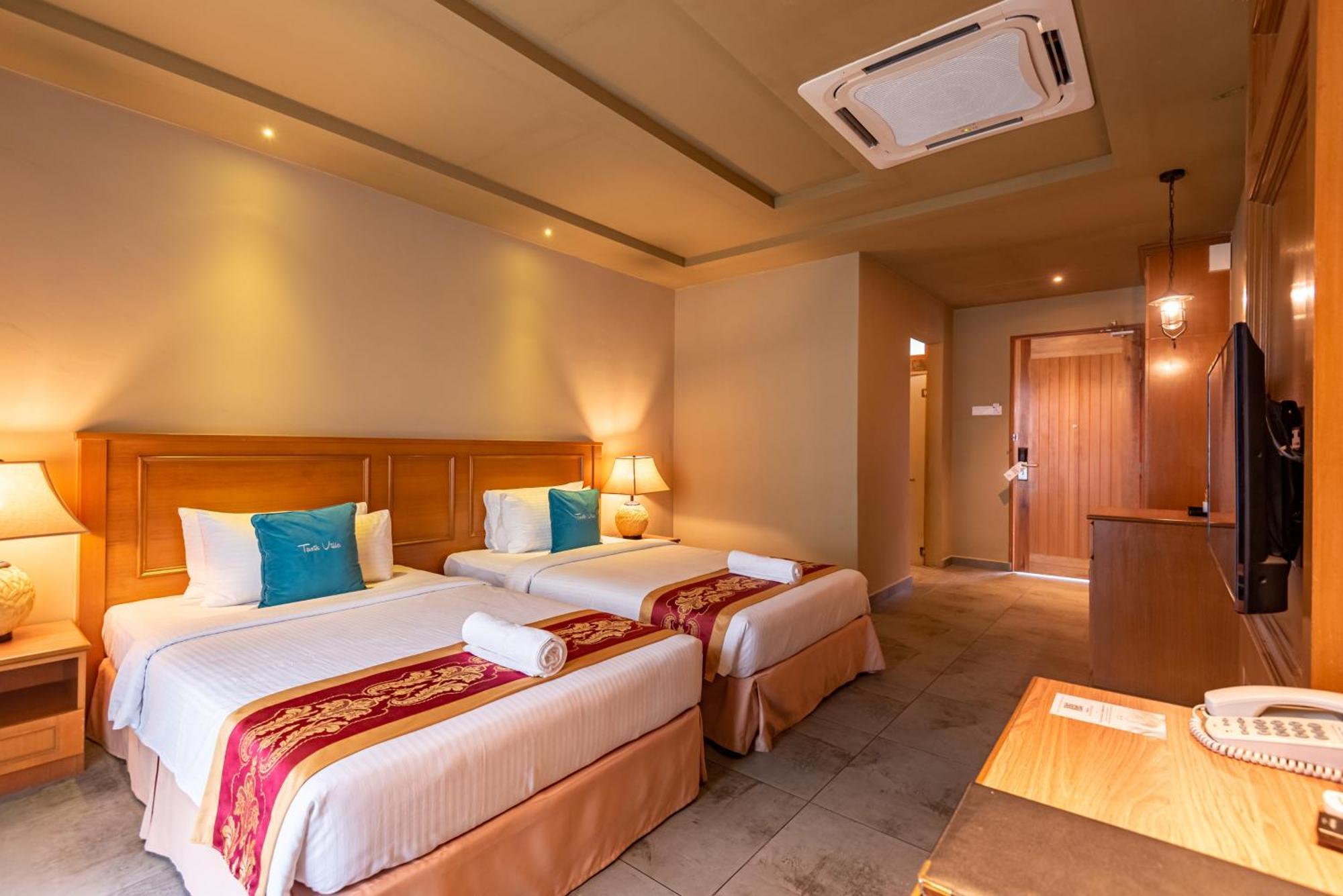 ตาซิก์ วิลลา อินเตอร์เนชั่นแนล รีสอร์ต Hotel พอร์ตดิ๊กสัน ภายนอก รูปภาพ Deluxe Room