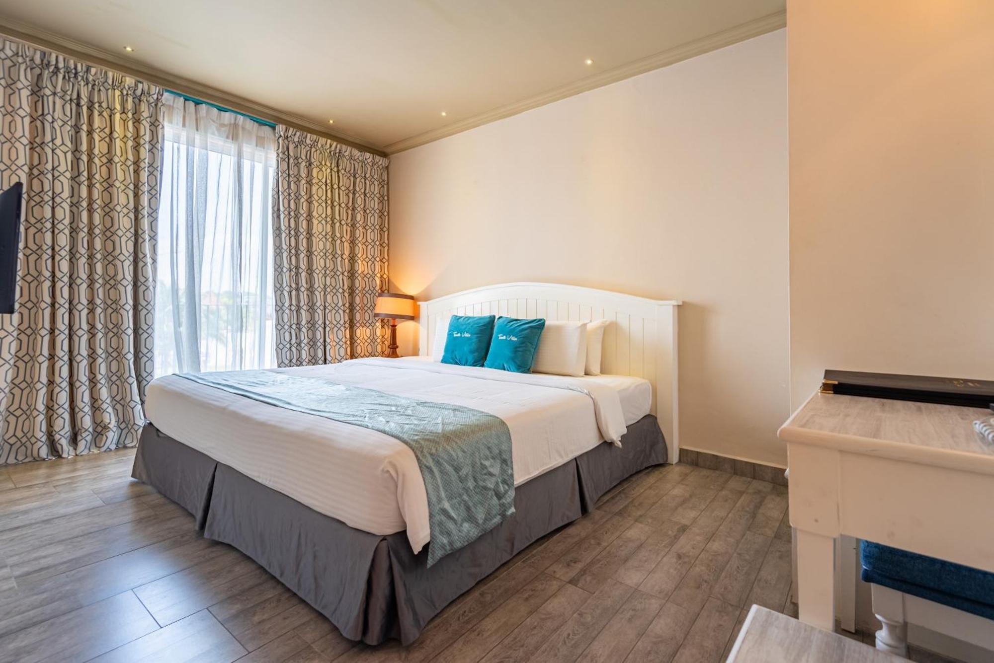 ตาซิก์ วิลลา อินเตอร์เนชั่นแนล รีสอร์ต Hotel พอร์ตดิ๊กสัน ภายนอก รูปภาพ Deluxe Room