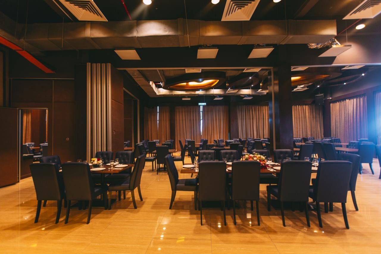 ตาซิก์ วิลลา อินเตอร์เนชั่นแนล รีสอร์ต Hotel พอร์ตดิ๊กสัน ภายนอก รูปภาพ The restaurant