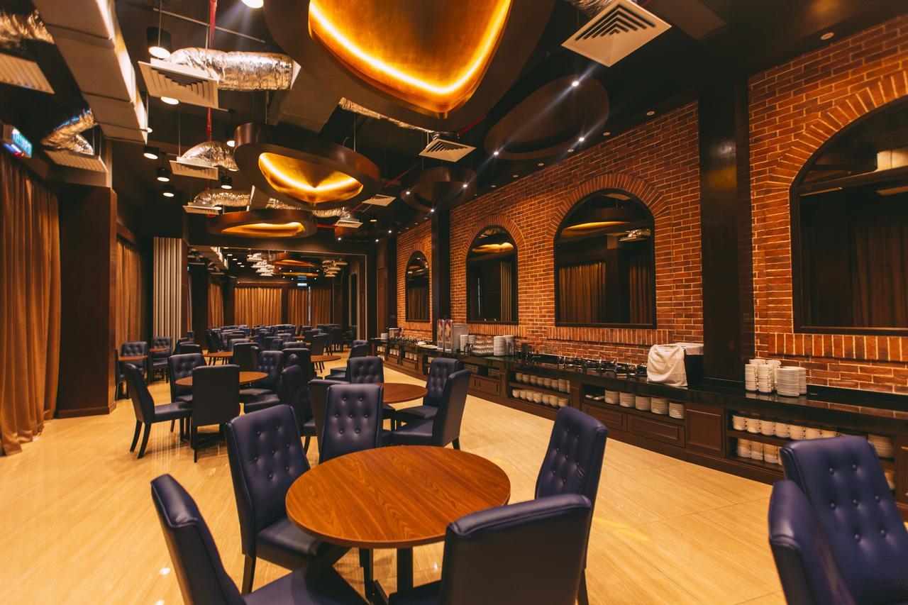 ตาซิก์ วิลลา อินเตอร์เนชั่นแนล รีสอร์ต Hotel พอร์ตดิ๊กสัน ภายนอก รูปภาพ The interior of the lounge
